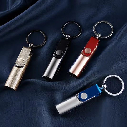 The four finishes together on dark blue cloth: antique bronze, black, rose gold and blue