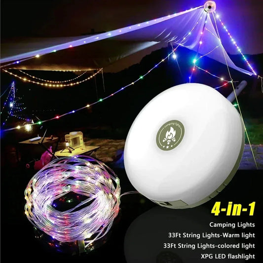 Round white camp light and a coil of color string light at night, with a tarp and its guy lines picked out in lit string