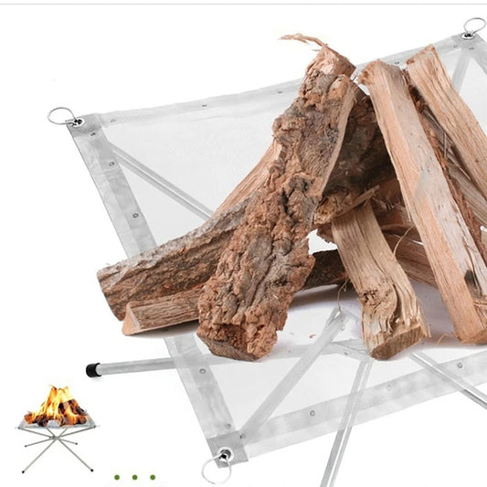 Close view of split logs resting on the stainless steel mesh, with a corner ring hooked over a leg